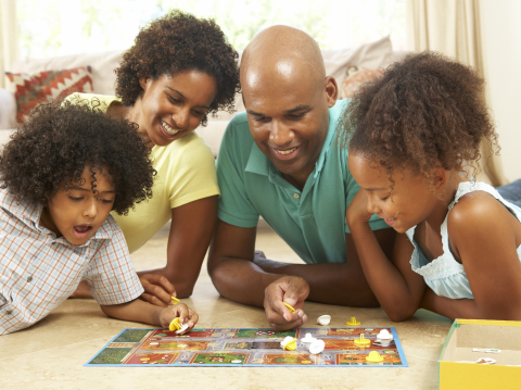 Family playing a board game