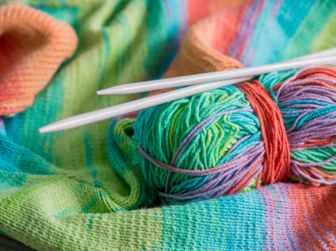 Ball of yarn with crochet sticks