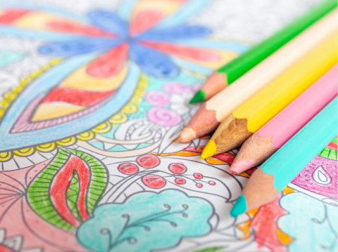 colored pencils over coloring sheet