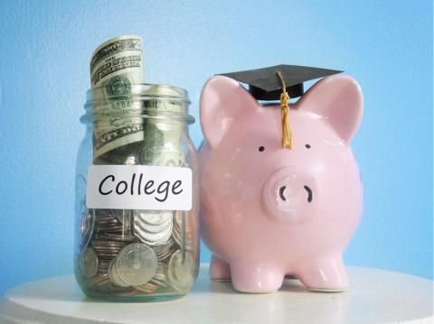 college fund jar next to piggy bank