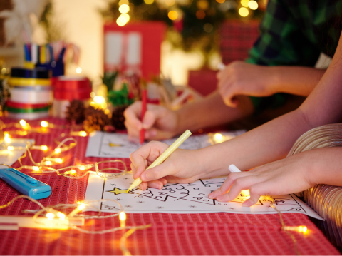 Someone coloring in a coloring sheet