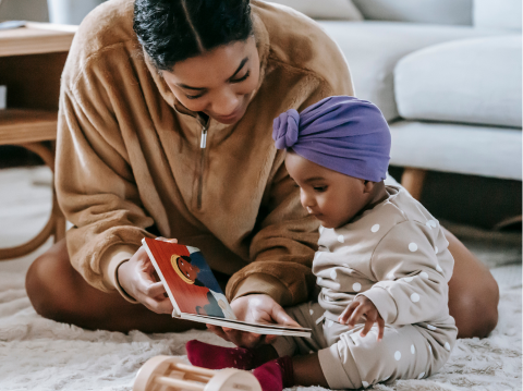 Mother reading to toddler