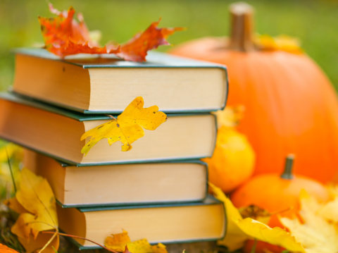 books in an autumn setting