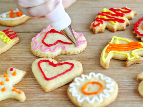 heart shaped cookies getting iced